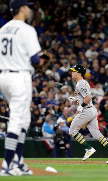 Coughlan's homer in 9th gives Oakland a 3-2 win over Seattle